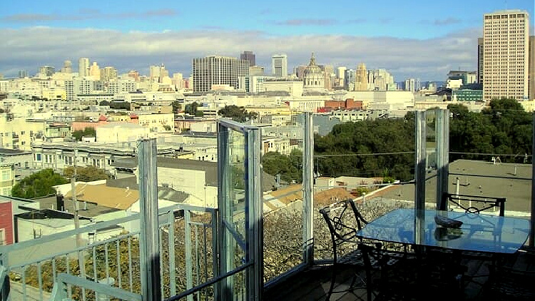 Balcony view of city from home exchange apartment